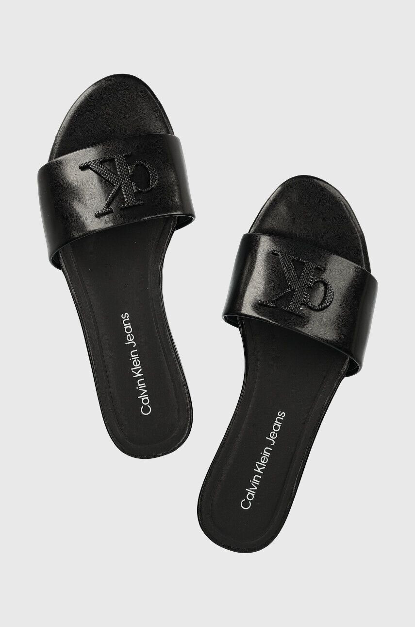 Calvin Klein Jeans Δερμάτινες παντόφλες FLAT SANDAL STRAP HW - Pepit.gr